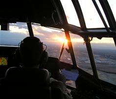 Sunset from the air, looking ahead