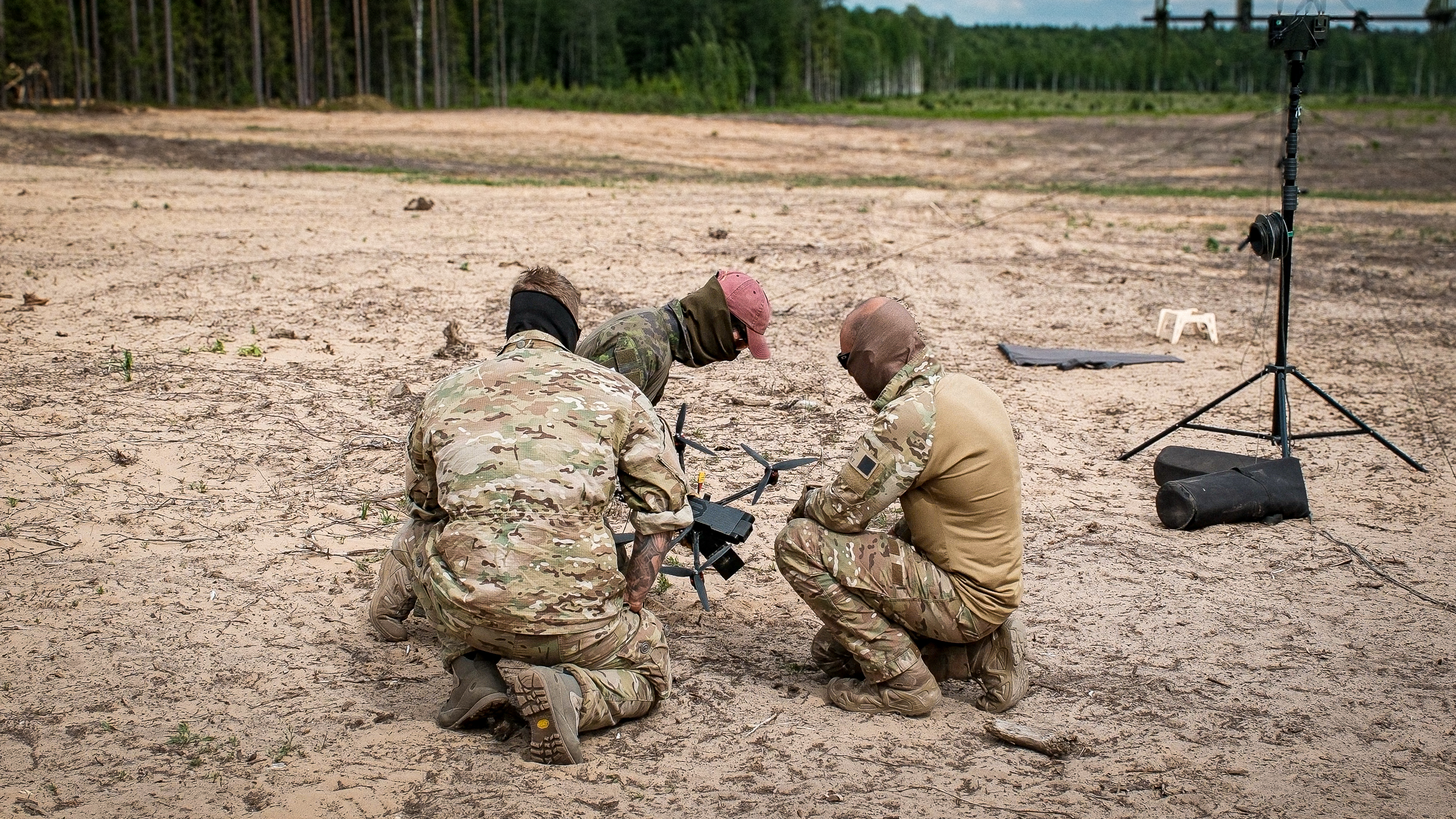 Drone operators at a military training range